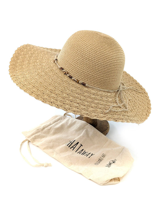 Beige straw hat with decorative band on a white background, accompanied by a 'NATWAY' branded drawstring bag.